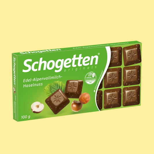 Schogetten Edel-Alpenvollmilch Haselnuss alpine milk hazelnut chocolate 100g – smooth milk chocolate with crunchy hazelnuts in individually portioned pieces